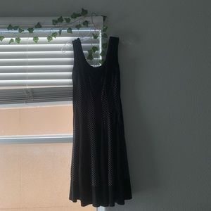 A mini black and white polkadot dress. It’s a small (6).